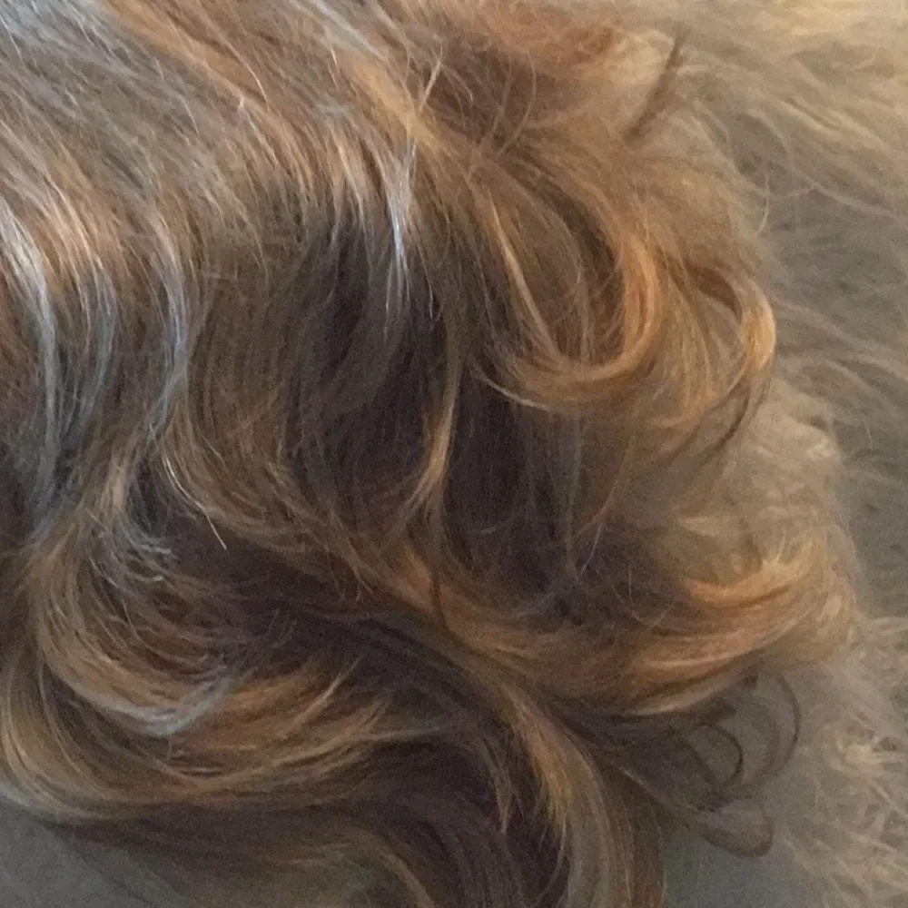Synthetic ponytail hair piece blondish colors clip on to your hair for length